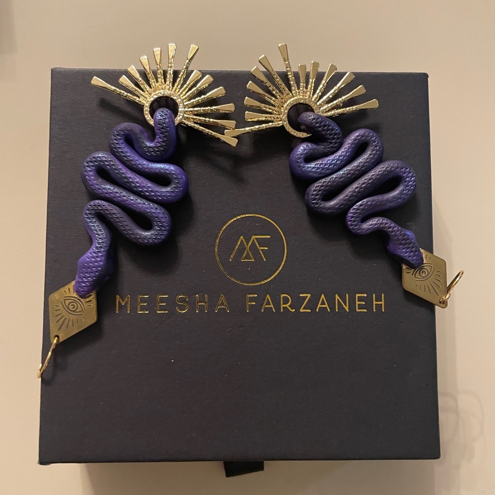 Meesha Farzaneh the Medusa snake earrings. Blue and gold with box